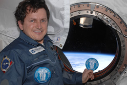 Charles Simonyi in space with the Institute seal patch