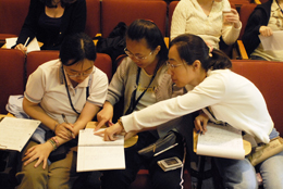 Participants collaborate at the 2009 Program for Women and Mathematics, photo by Cliff Moore