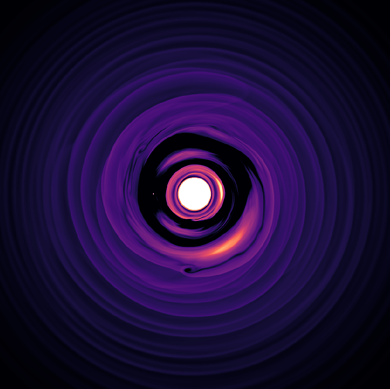 A simulated snapshot of a massive, gas-giant planet stirring a protoplanetary disk.
