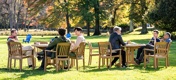 Scholars in conversation on IAS campus grounds
