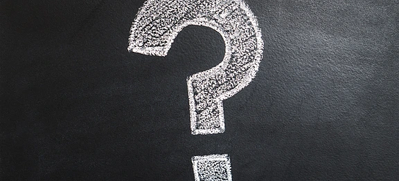 Question mark on blackboard