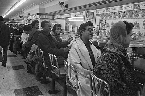 On February 13, 1960, students line the counter of a dime store in Greensboro, North Carolina, in protest of the store’s refusal to serve them.
