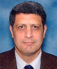 Michael Mousa Karayanni headshot