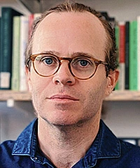 Christo Sims headshot