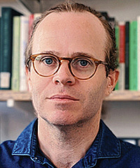 Christo Sims headshot