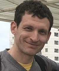 Danny Neftin headshot