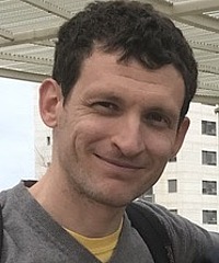 Danny Neftin headshot