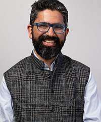 Adil Hasan Khan headshot