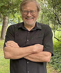 Alexander Migdal headshot