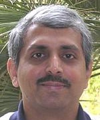 Dinesh Thakur headshot