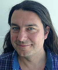 John Joseph M. Carrasco headshot