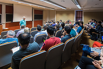 Arnold Levine gives a lecture in Bloomberg Hall