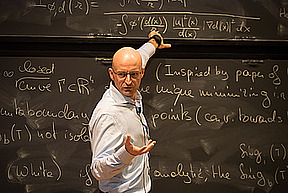 Camillo De Lellis at blackboard