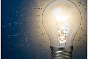 Lightbulb surrounded by mathematical symbols