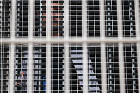 Prisoner behind bars