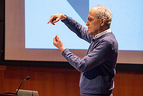 Edward Witten lectures at the podium