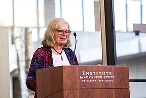 Karen Uhlenbeck gives remarks at the podium