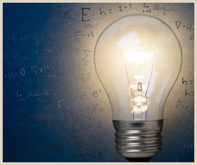 Lightbulb surrounded by mathematical symbols