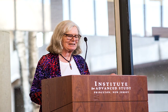 Karen Uhlenbeck gives remarks at the podium