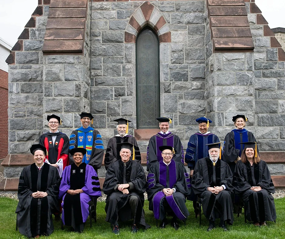 Honorary Doctorate recipients and Amherst College faculty in regalia