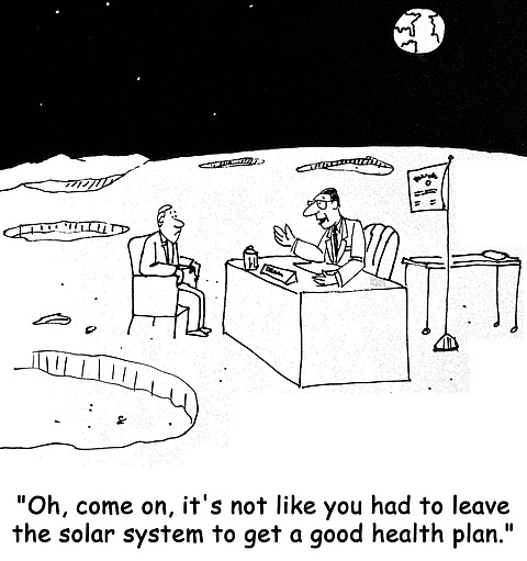 A New Yorker–style cartoon in which two men sit across from each other at a desk on the moon. The man behind the desk says, 'Oh, come on, it's not like you had to leave the solar system to get a good health plan.'