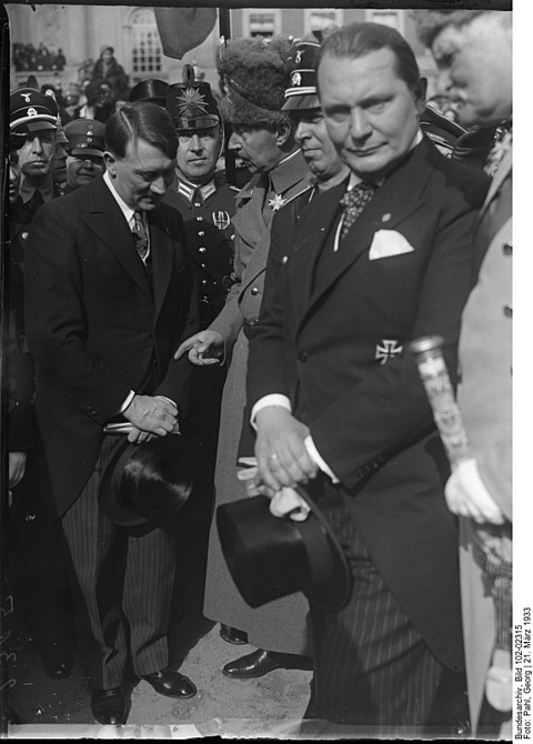 Adolf Hitler with Crown Prince Wilhelm, Hermann Göring stands to the side looking at the camera